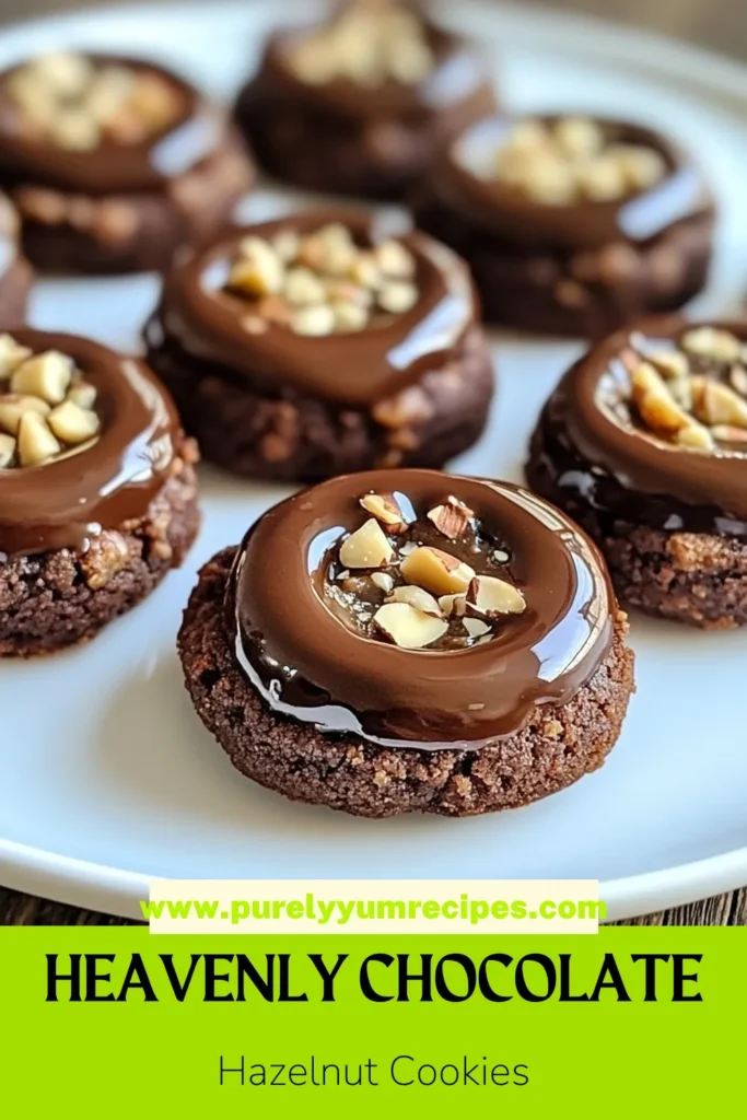 Indulge in the delightful taste of chocolate hazelnut thumbprint cookies that are sure to impress! This easy thumbprint cookie recipe features a rich combination of chocolate and hazelnuts, making it the perfect Nutella cookies recipe. Enjoy these tasty chocolate cookies with hazelnuts for any occasion. Follow the simple steps for a delicious treat! Save this recipe for later! #ThumbprintCookies #Nutella #ChocolateHazelnut #BakingIdeas