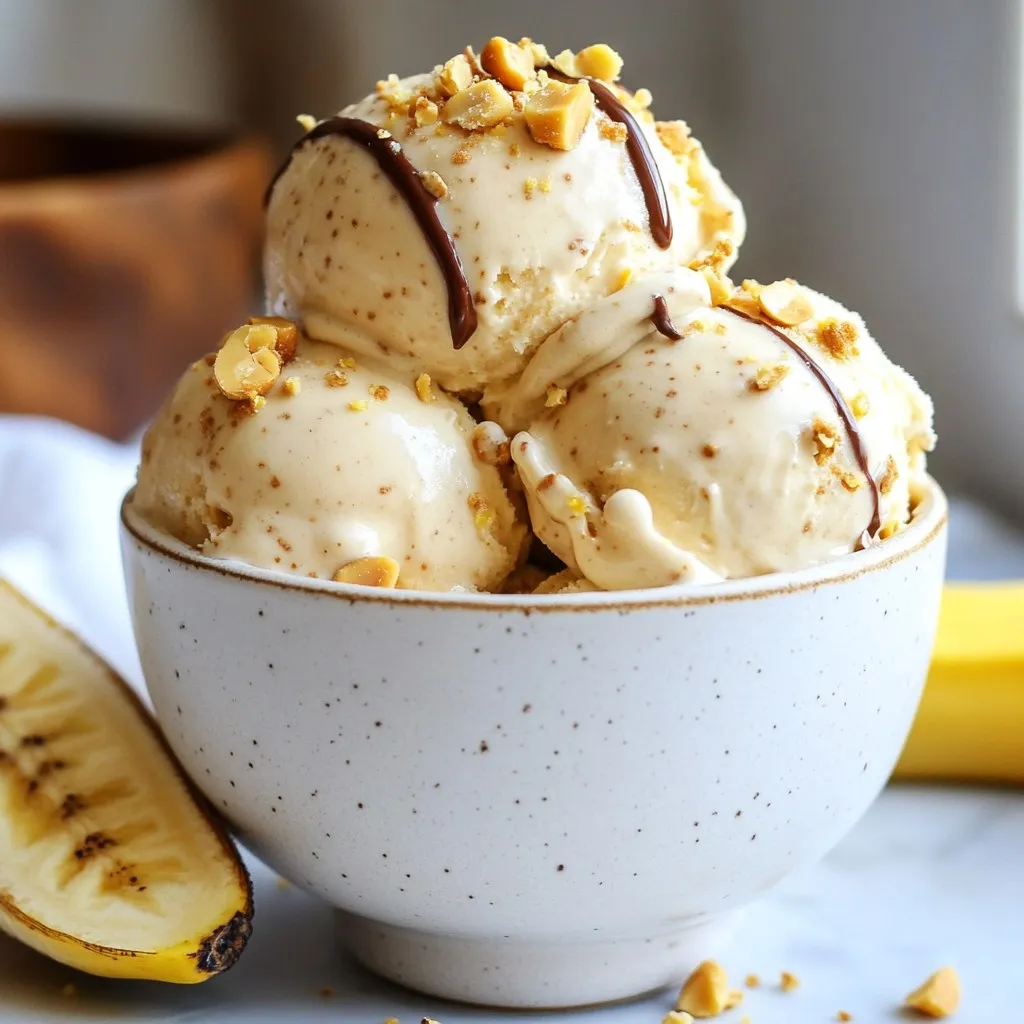 To make this creamy treat, gather these main ingredients: - 4 ripe bananas - 1/2 cup creamy peanut butter - 1/2 cup full-fat coconut milk - 1 teaspoon vanilla extract - Pinch of salt These items form the base of our ice cream. The ripe bananas provide natural sweetness and creaminess. The peanut butter adds rich flavor and protein. Full-fat coconut milk gives a smooth texture, while vanilla and salt enhance the taste. You can add a few optional ingredients for extra flavor: - 2 tablespoons maple syrup (for added sweetness) - Crushed peanuts (for topping) - Chocolate drizzle (for indulgence) - Cinnamon (for a warm touch) These extras let you customize your ice cream. You can adjust the sweetness with maple syrup. Toppings like crushed peanuts or chocolate make it even more fun! Each ingredient brings unique benefits: - Bananas: Rich in potassium and vitamins, they aid digestion. - Peanut Butter: Packed with protein and healthy fats, it helps keep you full. - Coconut Milk: Offers healthy fats and adds creaminess. - Maple Syrup: Natural sweetener with some antioxidants. - Vanilla Extract: May have calming effects and adds flavor. This ice cream not only tastes good but also nourishes you. Each bite is a mix of fun and health! {{ingredient_image_2}} To start, peel the ripe bananas. You want them to be very ripe for the best flavor. Slice the bananas into small, even rounds. This helps them freeze quickly and evenly. Next, spread the banana slices in a single layer on a baking sheet. Make sure they are not touching each other. Place the baking sheet in the freezer. Let the banana slices freeze for at least 2 hours. They should be completely solid before you move on. Once your banana slices are frozen, take them out of the freezer. Transfer the slices to a food processor. Add in the creamy peanut butter and full-fat coconut milk. This will give your ice cream a rich texture. If you like it sweeter, include the maple syrup too. Don’t forget the vanilla extract and a pinch of salt. Blend everything on high speed. Stop a few times to scrape down the sides. This ensures all the ingredients mix well. Keep blending until you reach a smooth and creamy consistency. After blending, taste your mixture. If you want more sweetness, add a bit more maple syrup. Blend again briefly to mix in the extra sweetness. If you prefer a soft-serve texture, serve it now! If you want a firmer ice cream, transfer the mixture to an airtight container. Freeze it for about 1-2 more hours. When you’re ready to serve, let it sit for about 5 minutes at room temperature. This makes scooping easier and more fun! Choose ripe bananas for the best taste and texture. Look for bananas with brown spots. These spots mean the bananas are sweet and soft. This softness helps create a creamy ice cream. If the bananas are too green, they won't blend well. Avoid using overripe bananas as they can taste too strong. When you blend, start on low speed. This helps break down the frozen bananas. Gradually increase the speed to high. Stop and scrape the sides of the bowl often. This step ensures all ingredients mix well. Blend until the mixture is smooth and creamy. Don’t rush; it might take a few minutes. If your blender struggles, add a little coconut milk to help. For the best taste, serve right after blending. This gives you a soft-serve style. If you prefer it firmer, freeze it for 1-2 hours. When ready to serve, let it sit at room temperature for 5 minutes. This makes scooping easier. Store leftovers in an airtight container. To keep it fresh, press plastic wrap directly on the surface before sealing. Enjoy within a week for the best flavor! Pro Tips Use Very Ripe Bananas: The riper the bananas, the sweeter and creamier the ice cream will be. Look for bananas with plenty of brown spots for the best flavor. Chill Your Ingredients: For an extra creamy texture, chill the peanut butter and coconut milk in the fridge before blending. This helps them incorporate more smoothly with the frozen bananas. Experiment with Sweetness: Adjust the amount of maple syrup based on your personal taste. Remember that freezing can dull sweetness, so taste the mixture before freezing! Storage Tips: Store any leftover ice cream in an airtight container. To prevent ice crystals, press a piece of parchment paper directly onto the surface before sealing. {{image_4}} Toppings can make your ice cream even better. You can try crushed peanuts, which add a nice crunch. Dark chocolate chips bring a rich taste. A drizzle of maple syrup gives a sweet touch. You can also sprinkle cinnamon for a warm flavor. Fresh fruit slices like strawberries or raspberries brighten up the dish. Get creative with your toppings and make your ice cream unique! If you want to change the sweet flavor, there are many options. You can swap maple syrup for agave nectar. Honey works too, but it's not vegan. For a low-calorie option, use stevia or erythritol. If you prefer a fruity taste, try adding pureed dates. Adjust the sweetness to what you like best. Remember, small changes can lead to big flavor! Mix-ins can make your ice cream more fun. Try adding dairy-free chocolate chunks for a sweet treat. Shredded coconut adds texture and a tropical vibe. You can also mix in some chia seeds for extra fiber. For a nutty twist, add almond slices or sunflower seeds. These extras can change the taste and make your ice cream special. Experiment with what you love! To store leftover ice cream, use an airtight container. This helps keep the ice cream fresh. Make sure to press a piece of plastic wrap against the surface before sealing the lid. This extra layer helps prevent ice crystals from forming. To maintain a creamy texture, avoid leaving the ice cream in the freezer for too long. If it hardens, let it sit at room temperature for a few minutes before scooping. Stirring the ice cream every 30 minutes while it freezes can also help keep it smooth and creamy. You can keep this ice cream for about two weeks in the freezer. However, for the best taste, enjoy it within a week. If you notice any ice crystals forming, it’s a sign that it’s time to eat up! Always store it in a cold part of the freezer, away from the door. This helps maintain a consistent temperature. Yes, you can use other nut butters. Almond butter or cashew butter works well too. Just make sure the nut butter is smooth and creamy. This keeps the ice cream soft and rich. Each nut butter adds its own flavor. Almond butter gives a nutty taste, while cashew butter adds a mild sweetness. Absolutely! This recipe is perfect for kids. It uses natural ingredients like bananas and peanut butter. Kids love the sweet, creamy texture. Plus, it has no added dairy. You can even let them help with the mixing. It’s a fun way to get them involved in the kitchen! If you don’t have a food processor, don’t worry! You can use a blender instead. Just make sure to cut the frozen bananas into smaller pieces. This helps the blender work better. Blend in batches if needed. You can also use a potato masher for a chunky texture. It may take more time, but you’ll still enjoy a tasty treat! This blog post shares how to create delicious vegan peanut butter banana ice cream. We explored key ingredients that not only taste great but also provide health benefits. I gave step-by-step instructions to make your ice cream smooth and creamy. Tips helped you choose the best bananas and blend effectively. We looked at fun variations for flavor and how to store your treats properly. Making vegan ice cream is simple and rewarding. Enjoy your creation and share it with others!